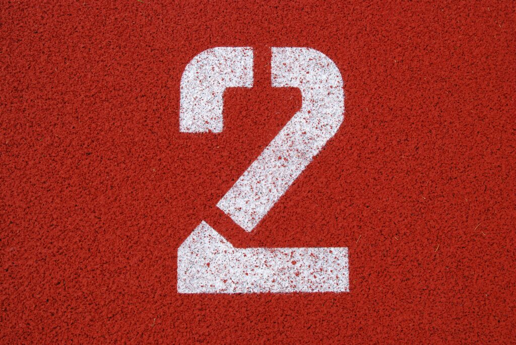 Person reading Japanese newspaper for JLPT preparation