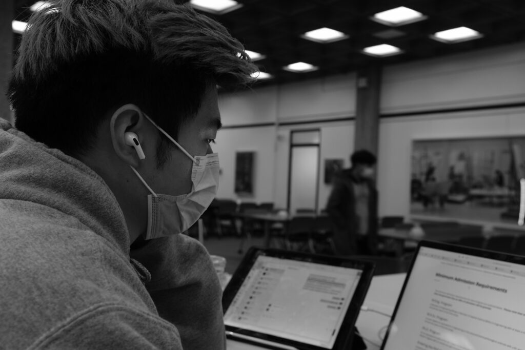 Student practising Japanese listening with headphones